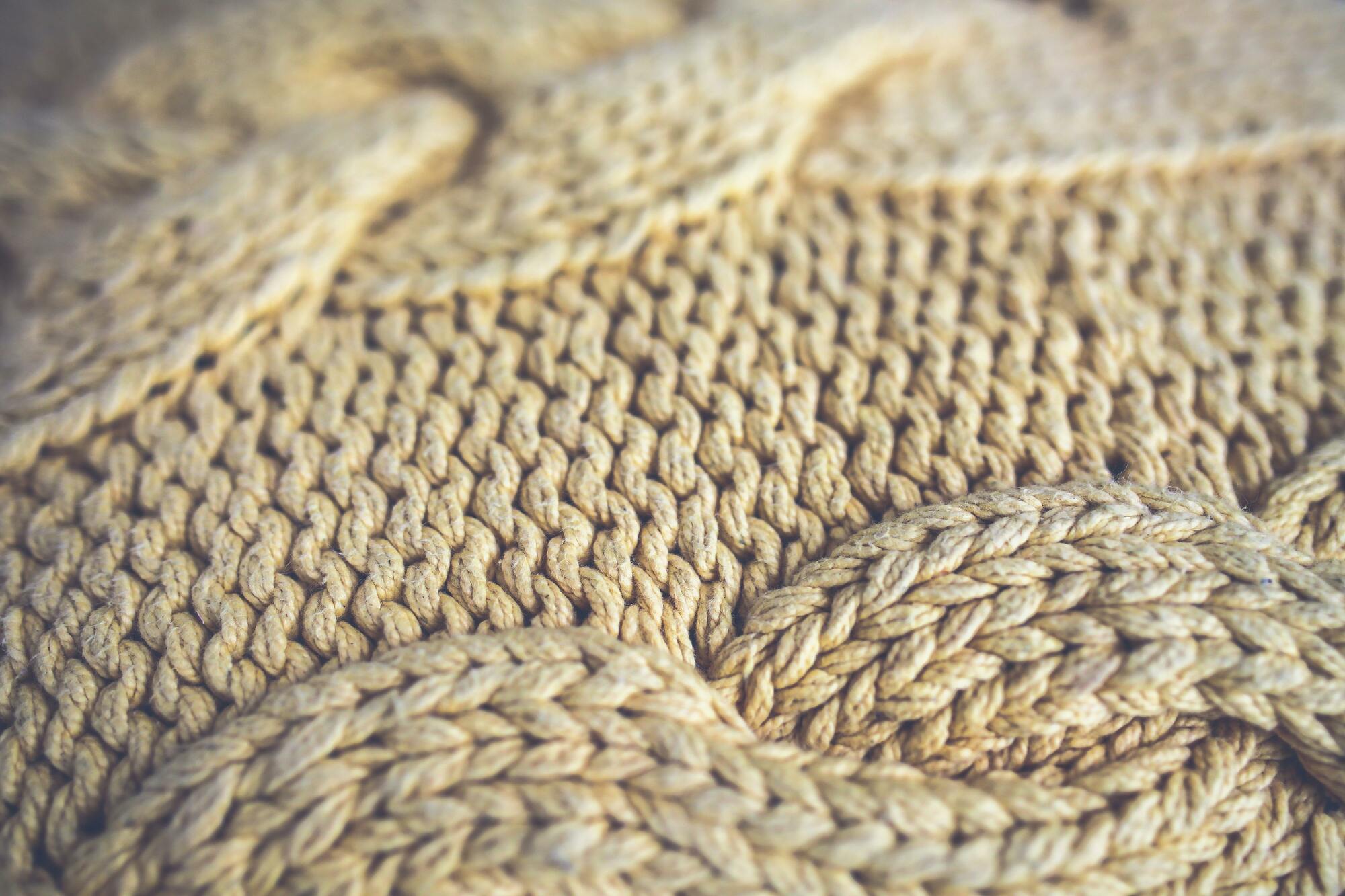 close-up of the stitches in a cable-knit